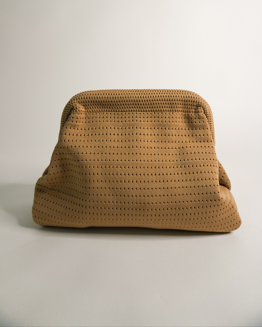 Brown textured bag on a light gray background