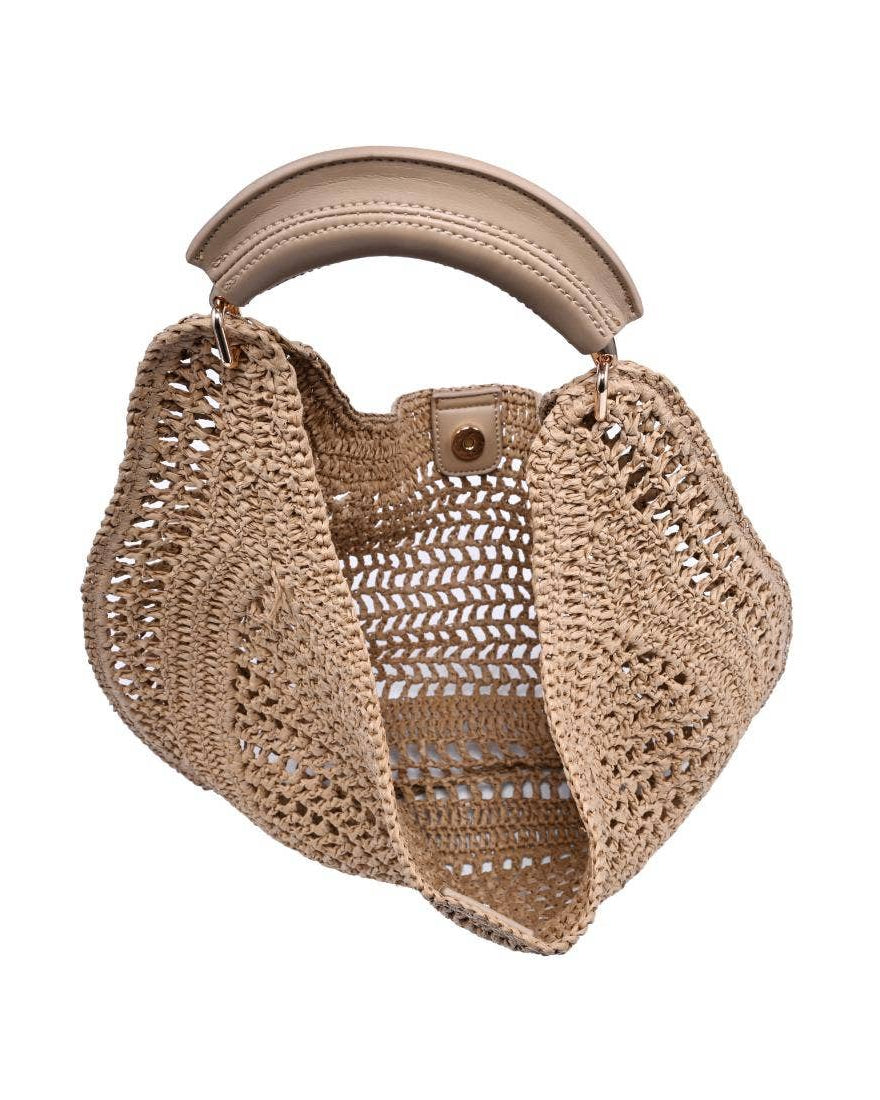 Beige woven handbag with leather handle on a white background