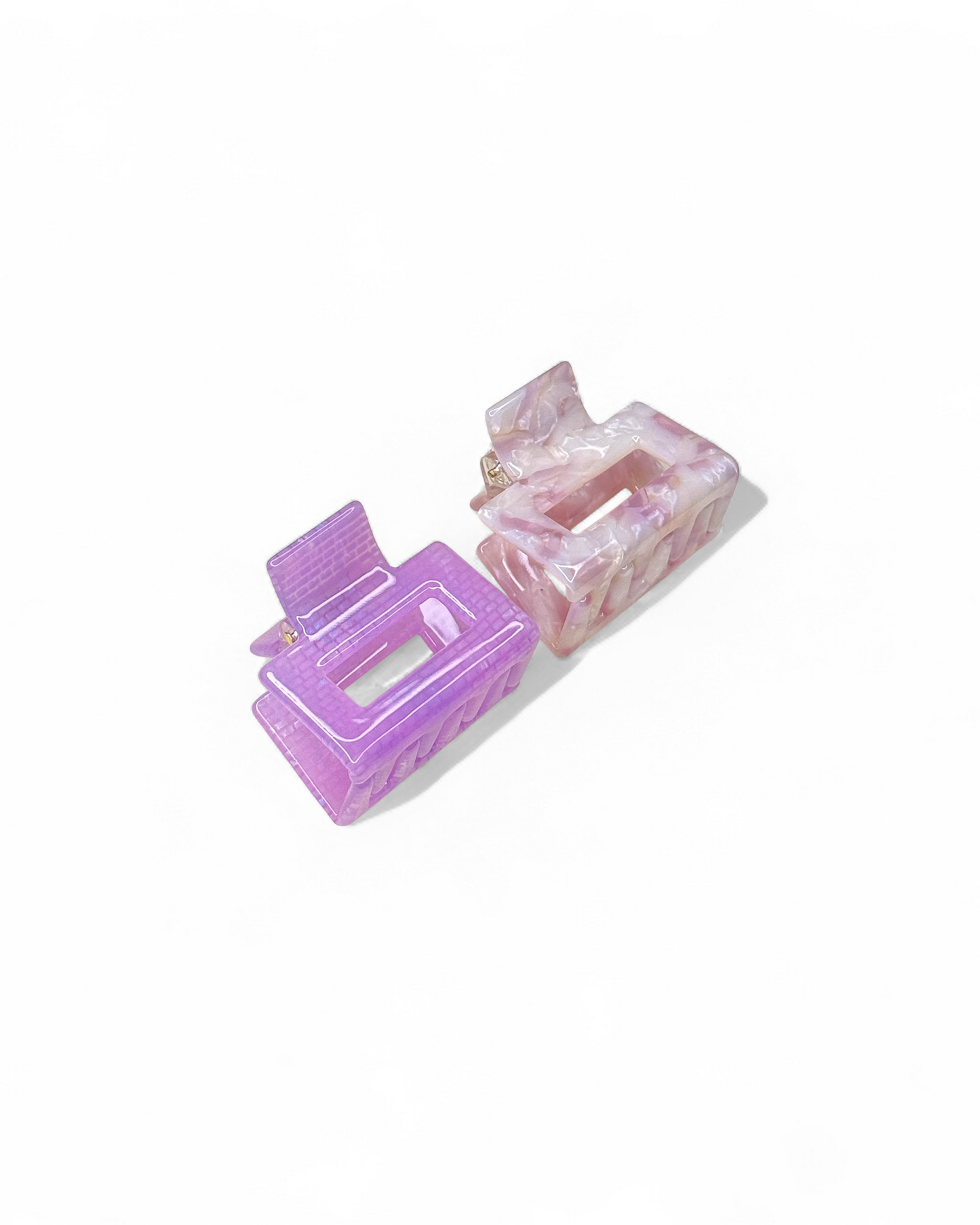 The HoneyLux Acetate Mini Square Claws clips in the color Sweetheart on a white background