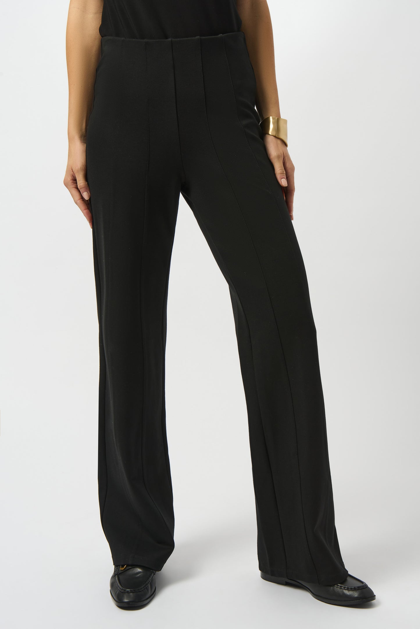 Model is wearing Joseph Ribkoff Heavy Knit Wide Leg Pull-On Pants in black on a white background