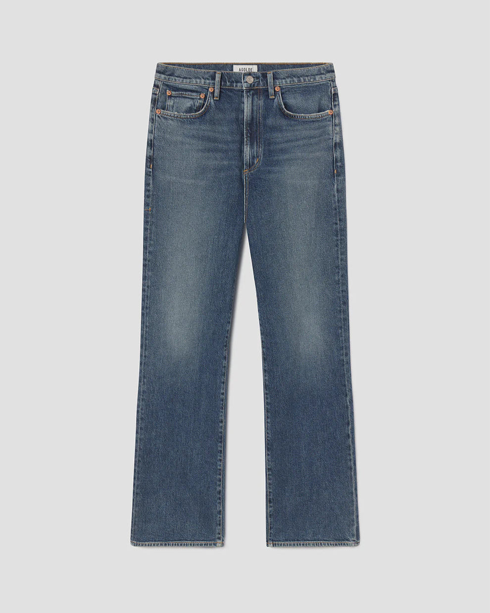 Pair of blue jeans on a light gray background