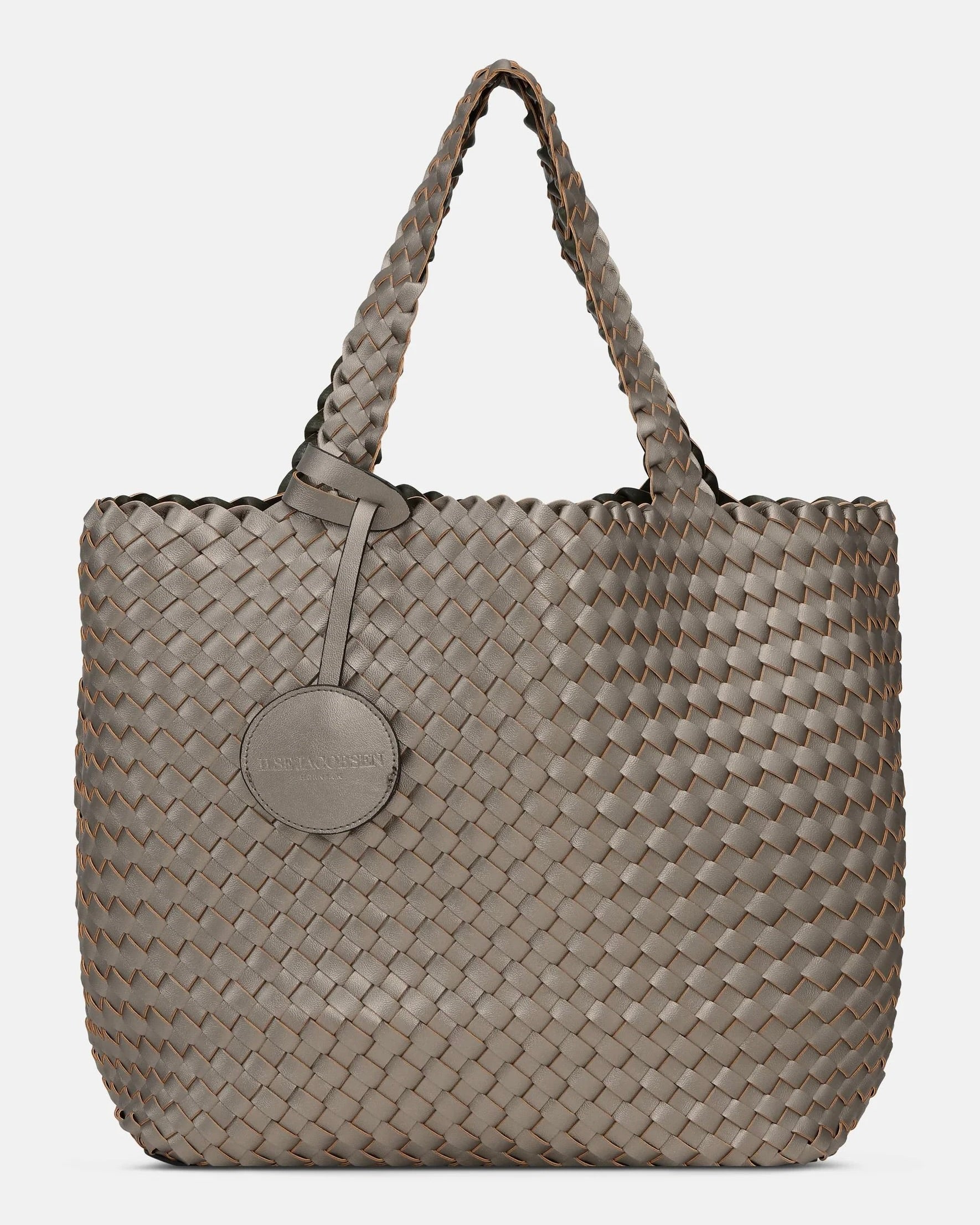 Light grey woven handbag with a circular clasp on a white background