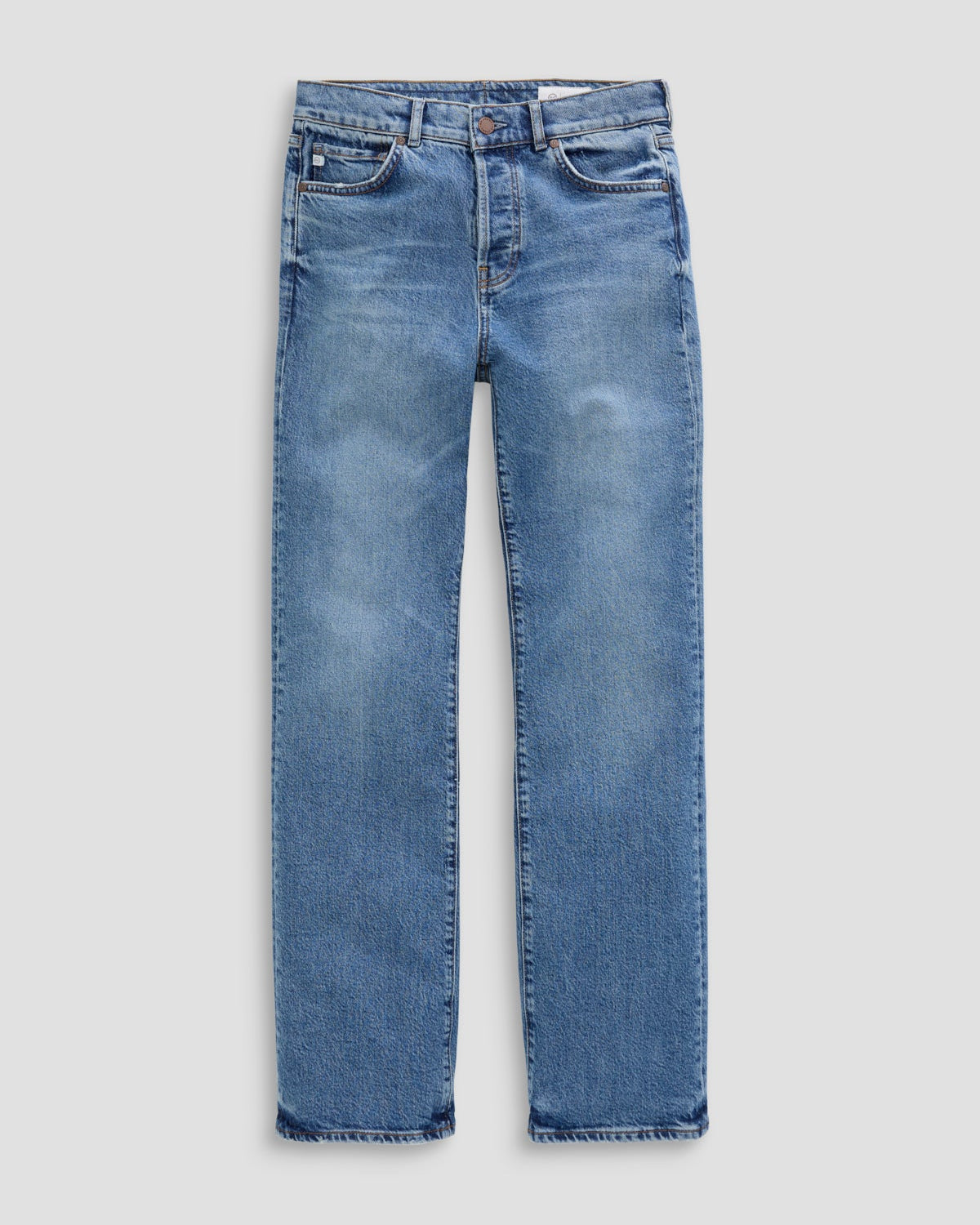 Blue jeans on a light gray background