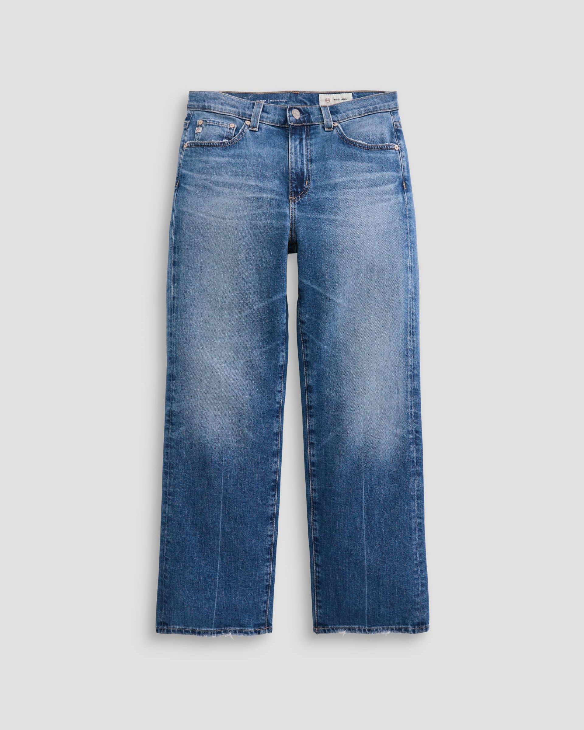Blue jeans on a light gray background