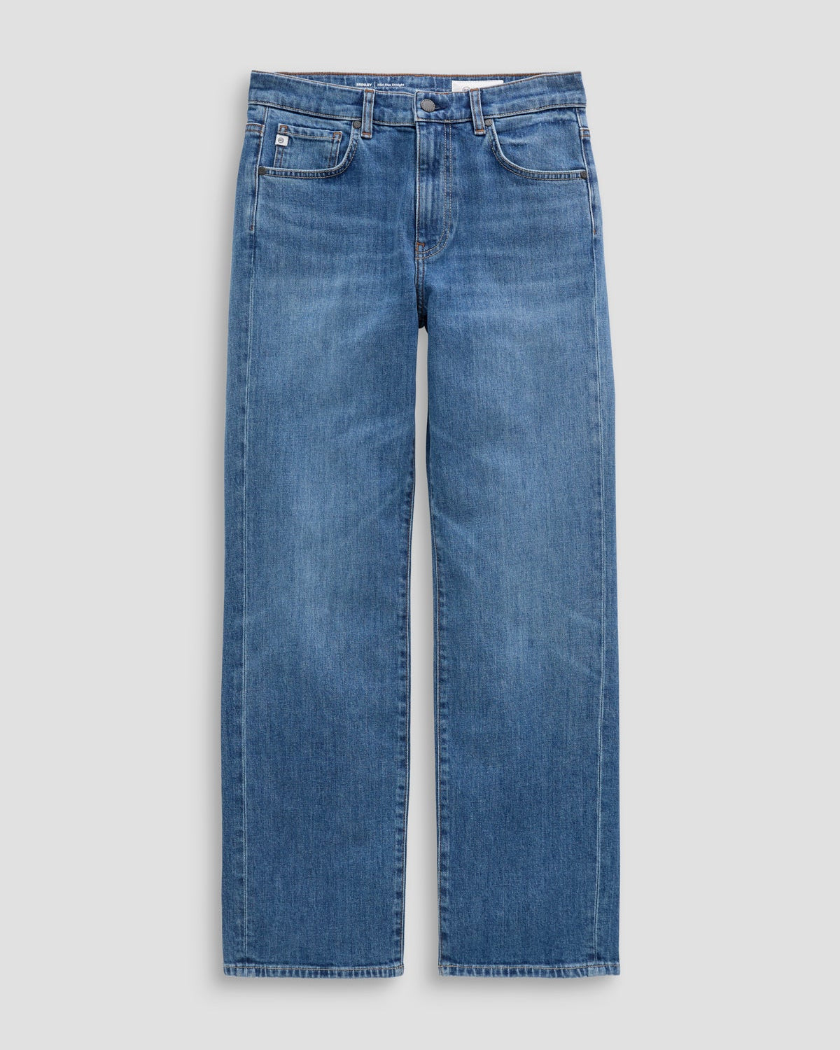 A pair of medium-wash blue denim jeans with a straight-leg fit, shown flat against a light gray background.