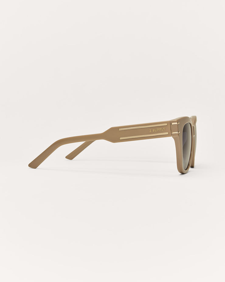 Beige sunglasses on a white background