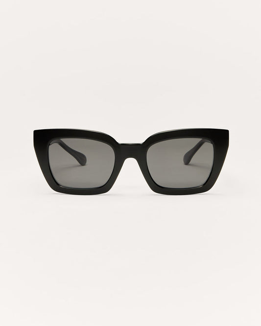 Black sunglasses with gradient lenses on a white background