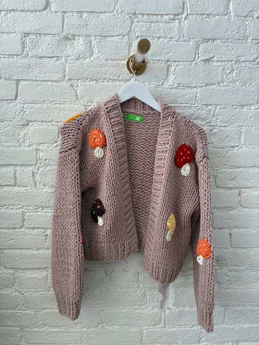 front side of mauve knitted cardigan with orange, yellow, brown, and red muchrooms