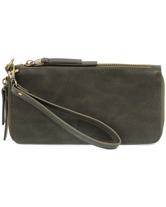 Juniper vegan leather wallet with wrist strap against a white background.