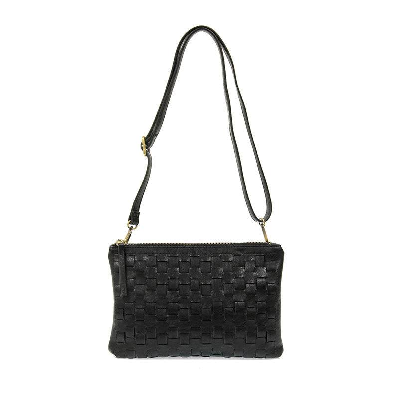 Black woven convertible crossbody clutch with strap attached against a white background.
