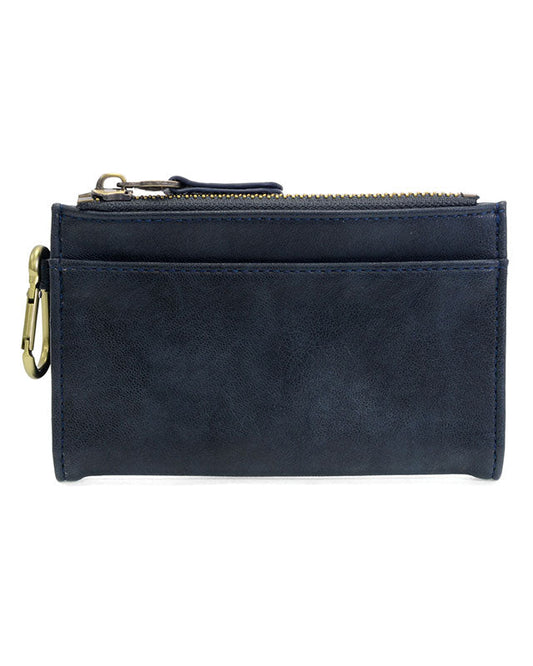 Navy vegan leather wallet with brass accents against a white background.