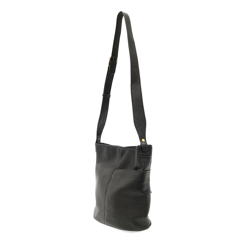 Black vegan leather bucket handbag with gold accents against a white background.