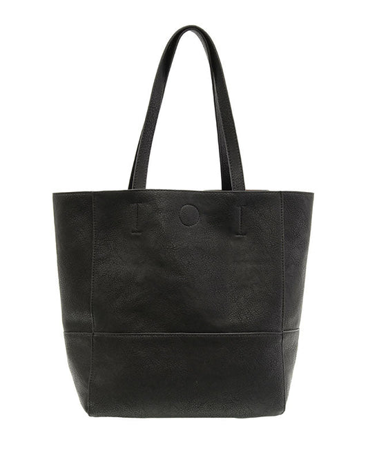 Black vegan leather raw edge tote against a white background.