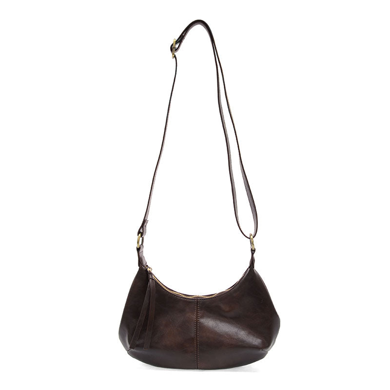 Mocha vegan leather shoulder bag with brass accents against a white background.