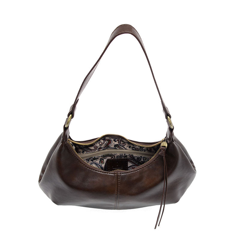 Mocha vegan leather shoulder bag with brass accents against a white background.