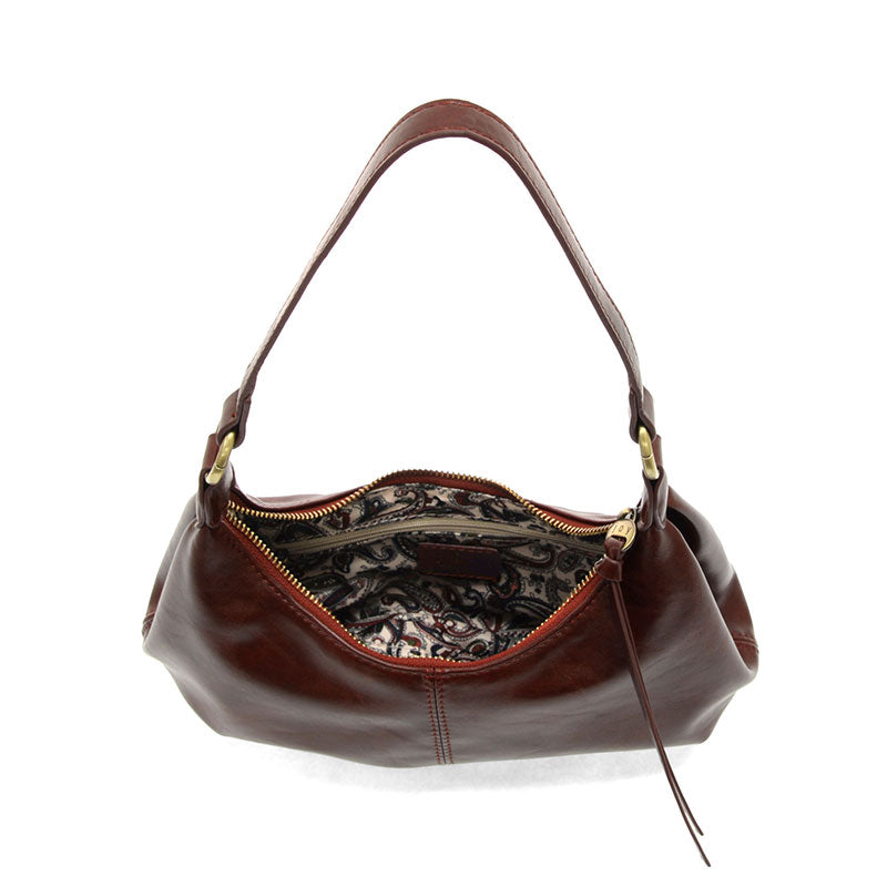 Maroon vegan leather shoulder bag against a white background.