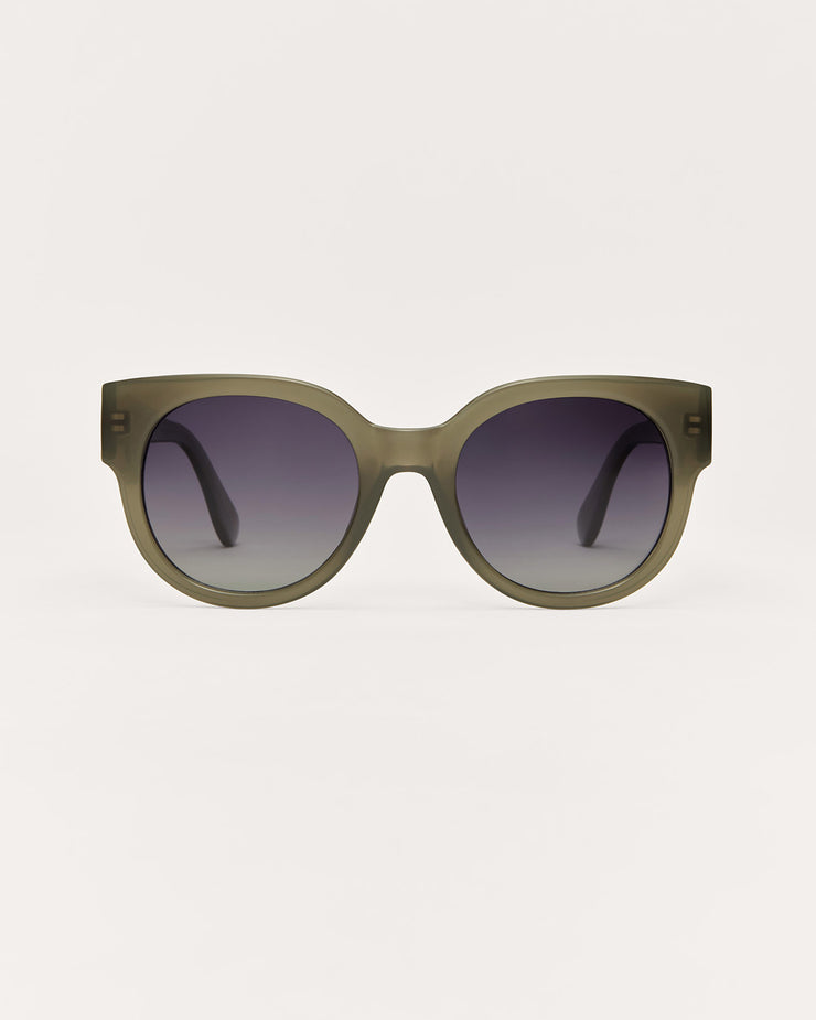 Black sunglasses with dark lenses on a white background