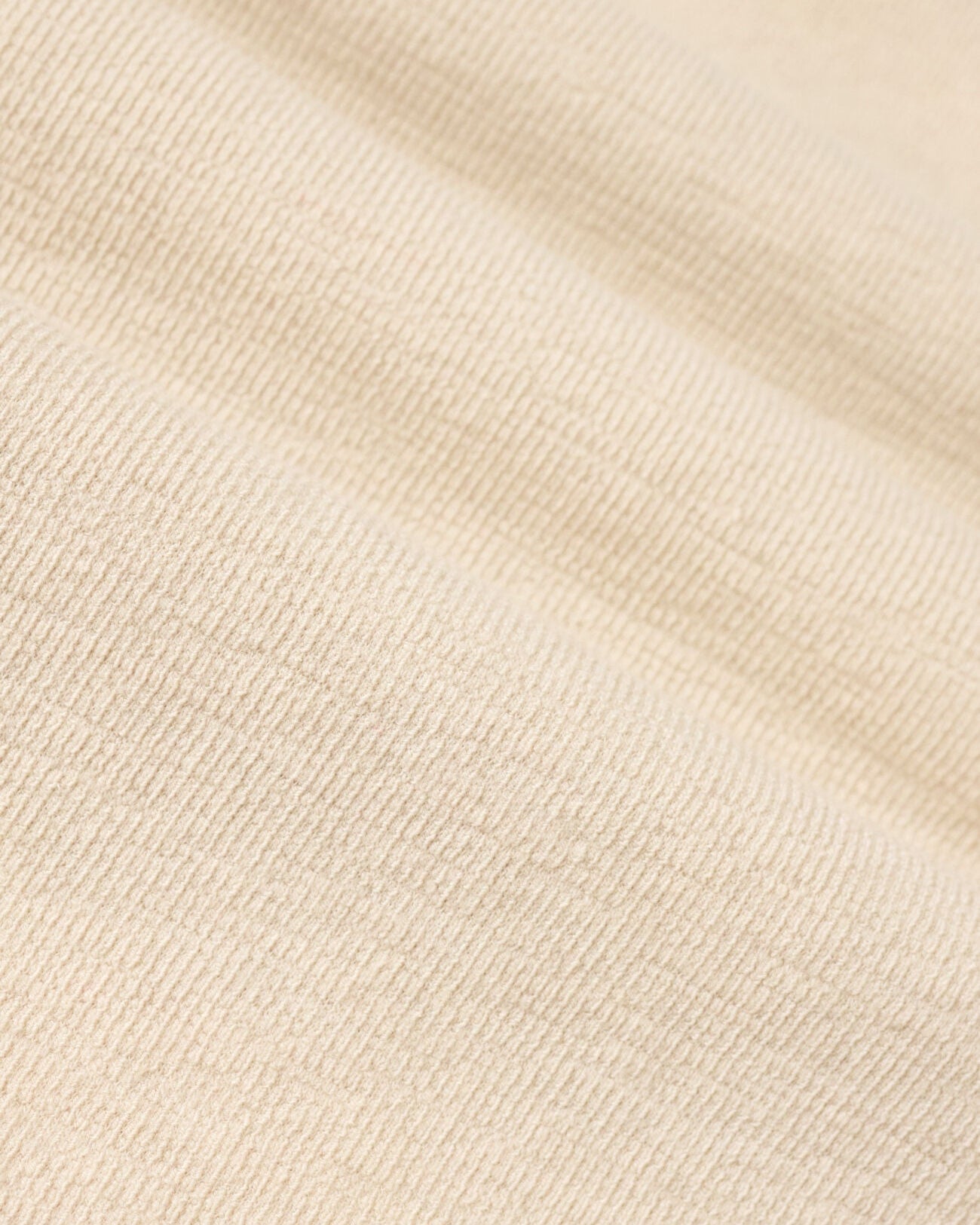 Close-up of beige fabric texture
