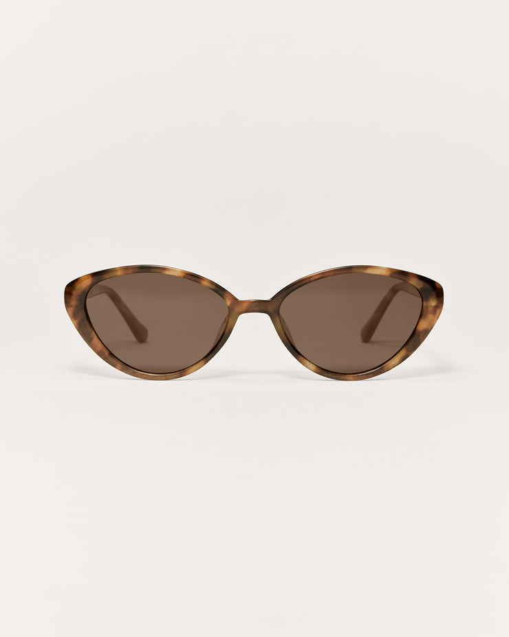 Cat-eye sunglasses with tortoiseshell frame on a white background