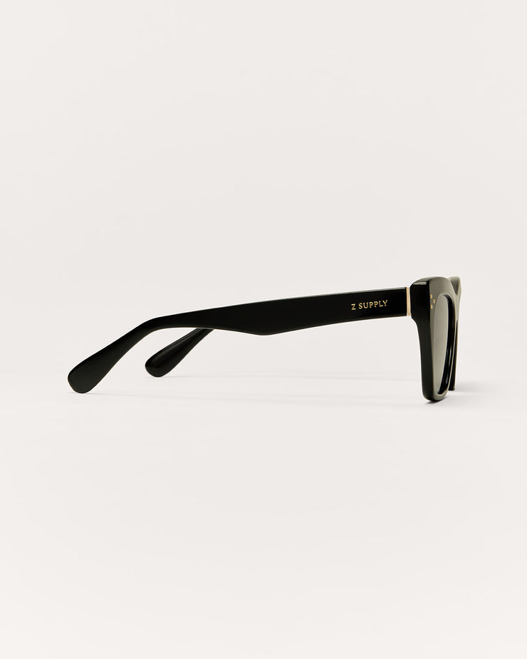 Round sunglasses with tortoiseshell frame on a white background