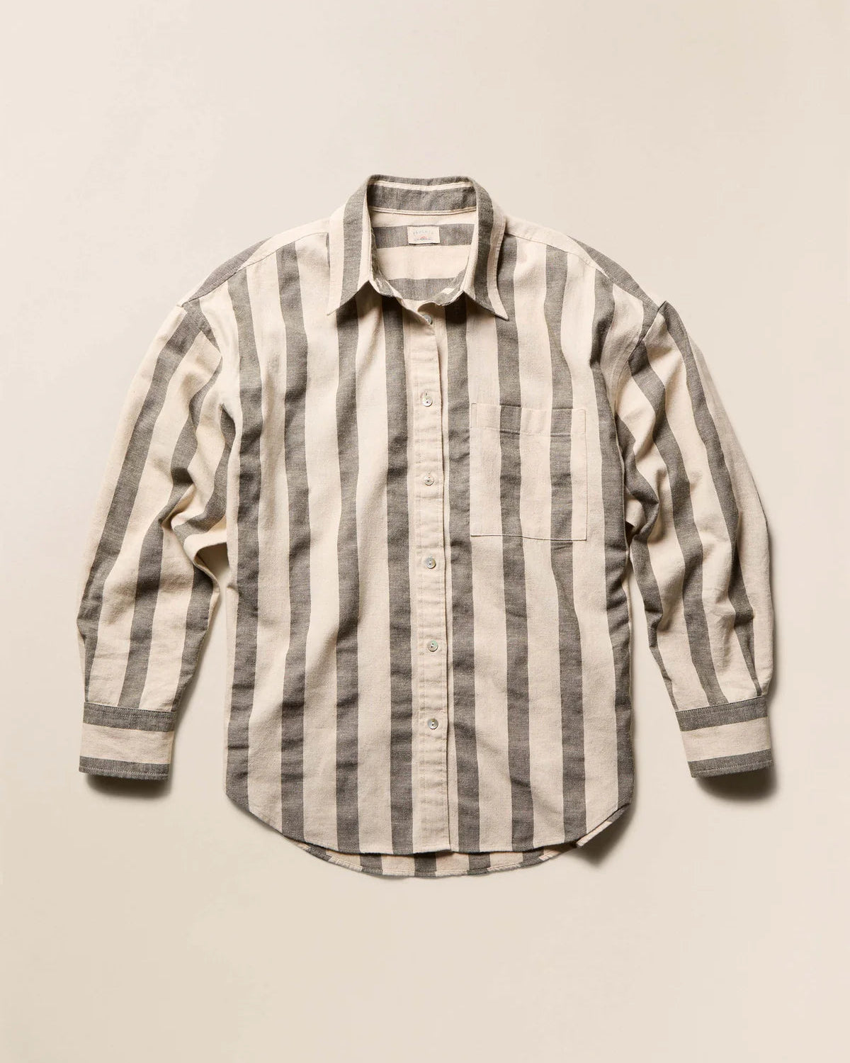 Striped shirt on a beige background