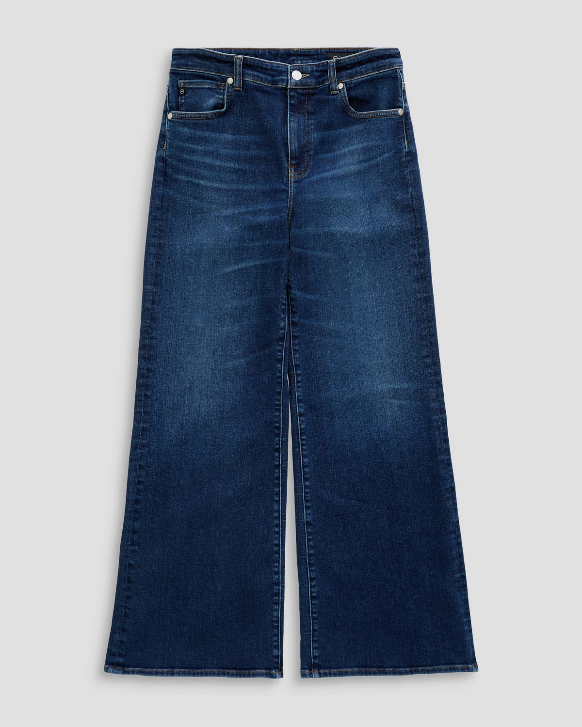 Pair of blue jeans on a light gray background