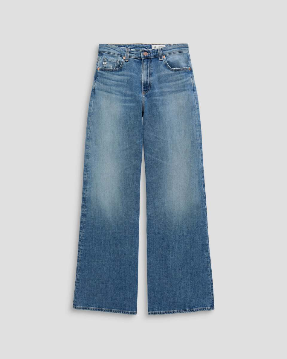 Pair of blue jeans on a light gray background
