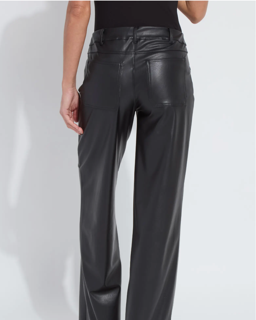 Black leather pants worn by a person on a white background