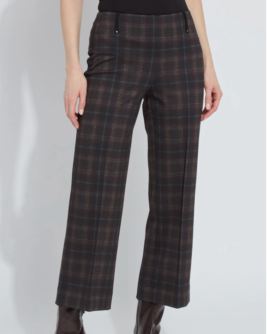 Plaid pants worn by a person on a white background