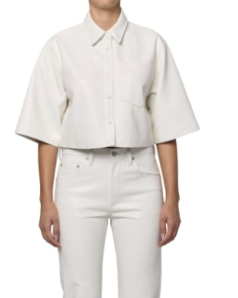 Person wearing a white short-sleeve shirt and pants on a white background