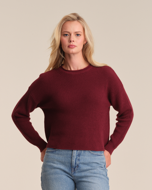 Model is wearing 525 America DAPHNE CROPPED PULLOVER in color OXBLOOD. 
