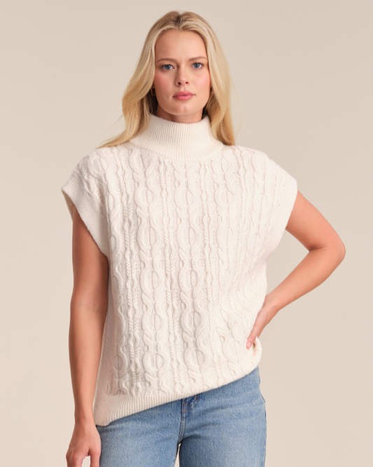 Model is wearing 525 America RAE WOOL CASHMERE CABLE VEST in SEA SALT. 