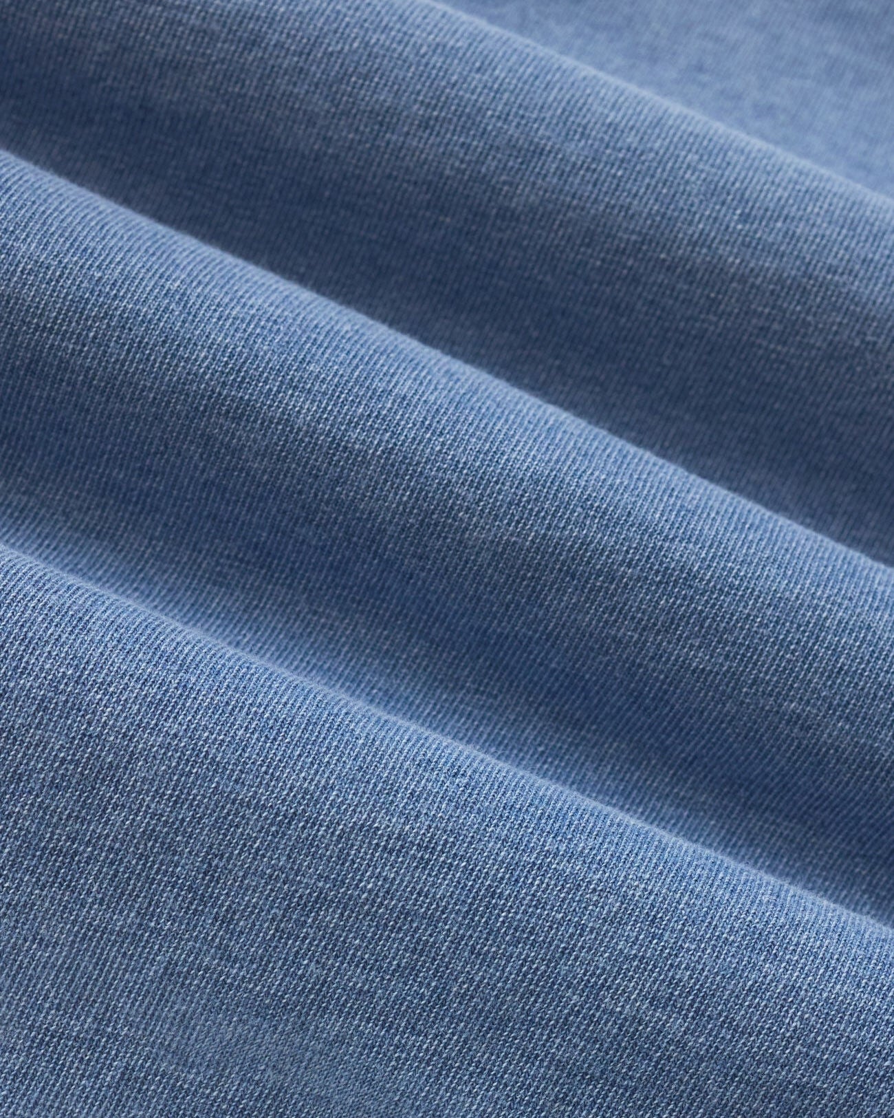 Close-up of blue fabric with a soft texture
