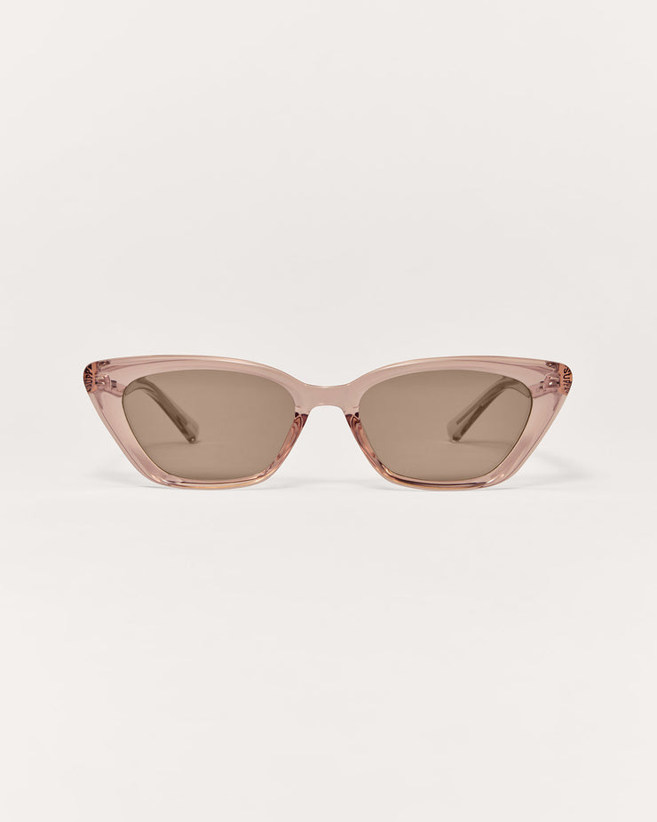 Pink cat-eye sunglasses on a white background