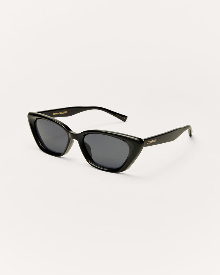 Black cat-eye sunglasses on a white background