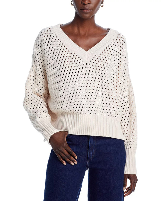 Model Wearing French Connection Nini Crochet V Neck Jumper wearing jeans on a white background