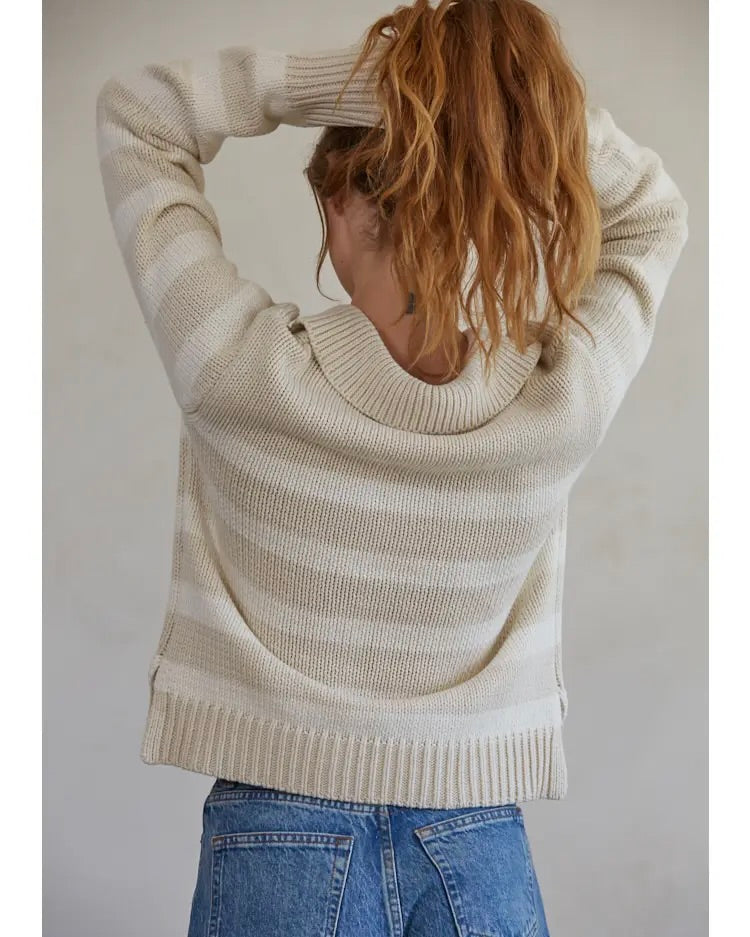 Model wearing By Together Chunky Polo Striped Sweater in white/sand wearing jeans on a white background