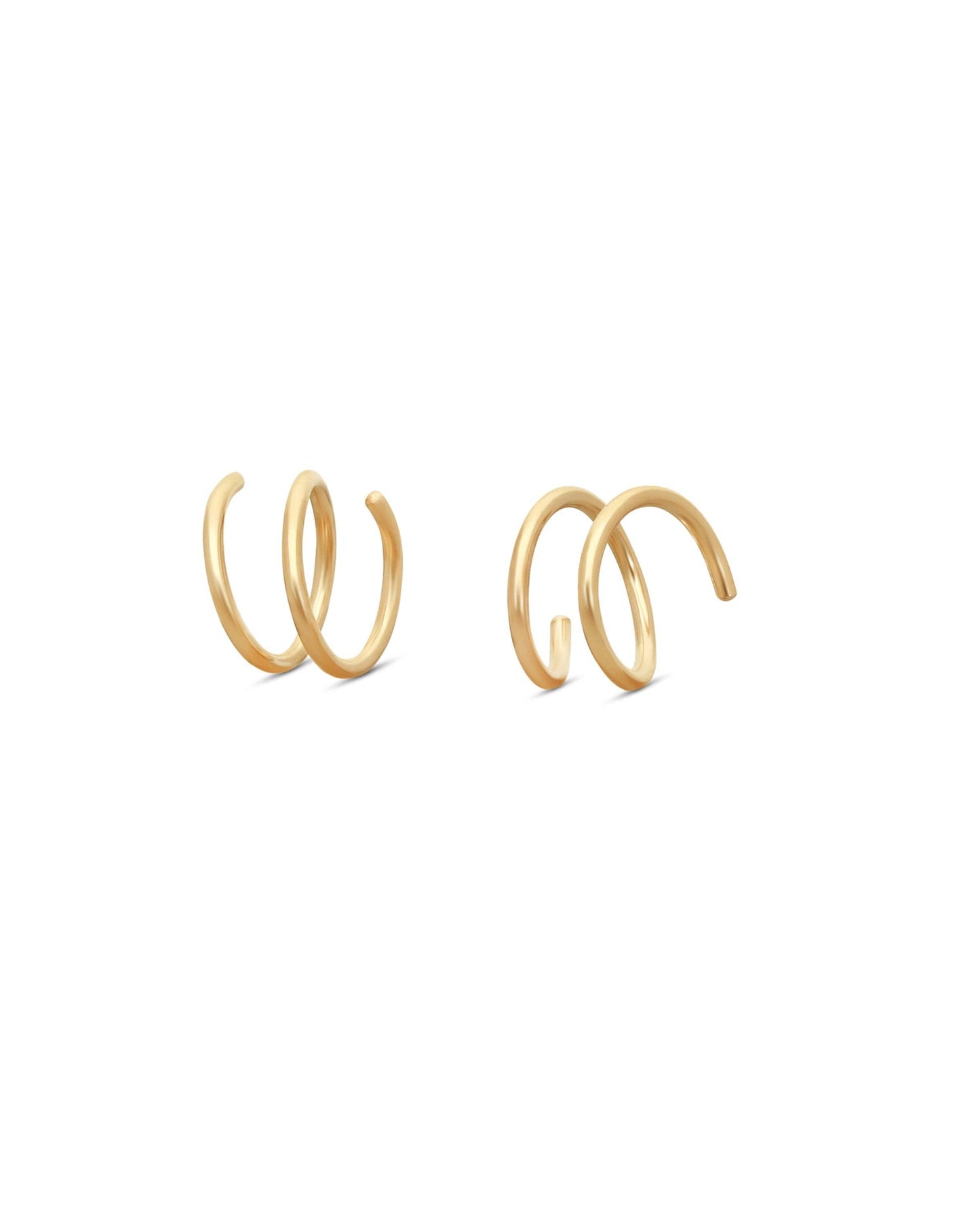 Pair of gold hoop earrings on a white background