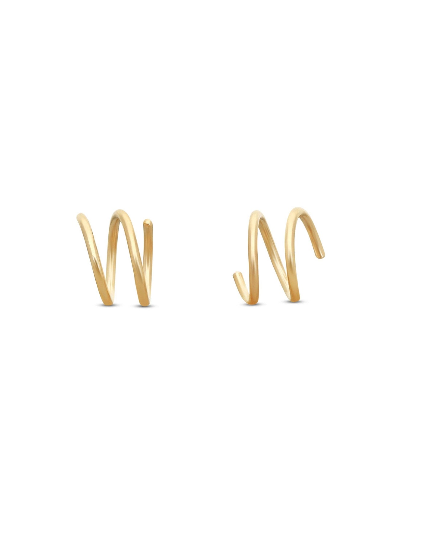 Pair of gold spiral earrings on a white background