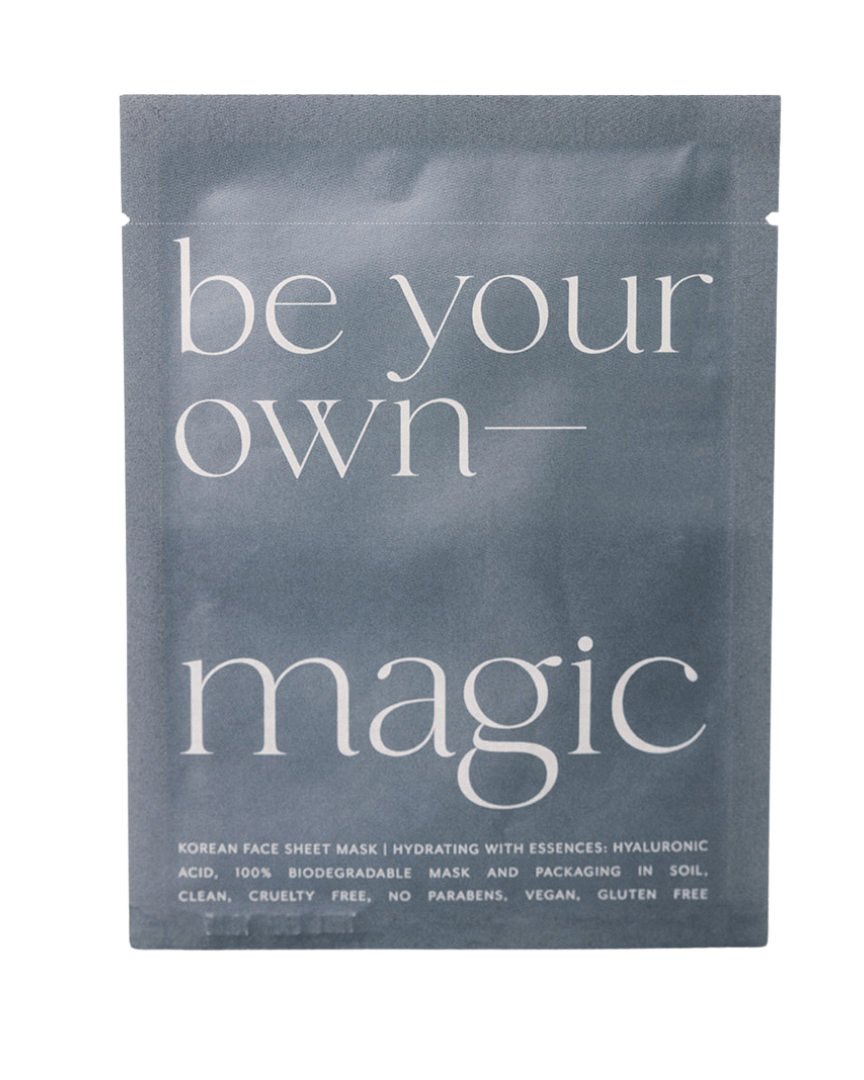 Korean face sheet mask packaging with 'be your own magic' text on a white background