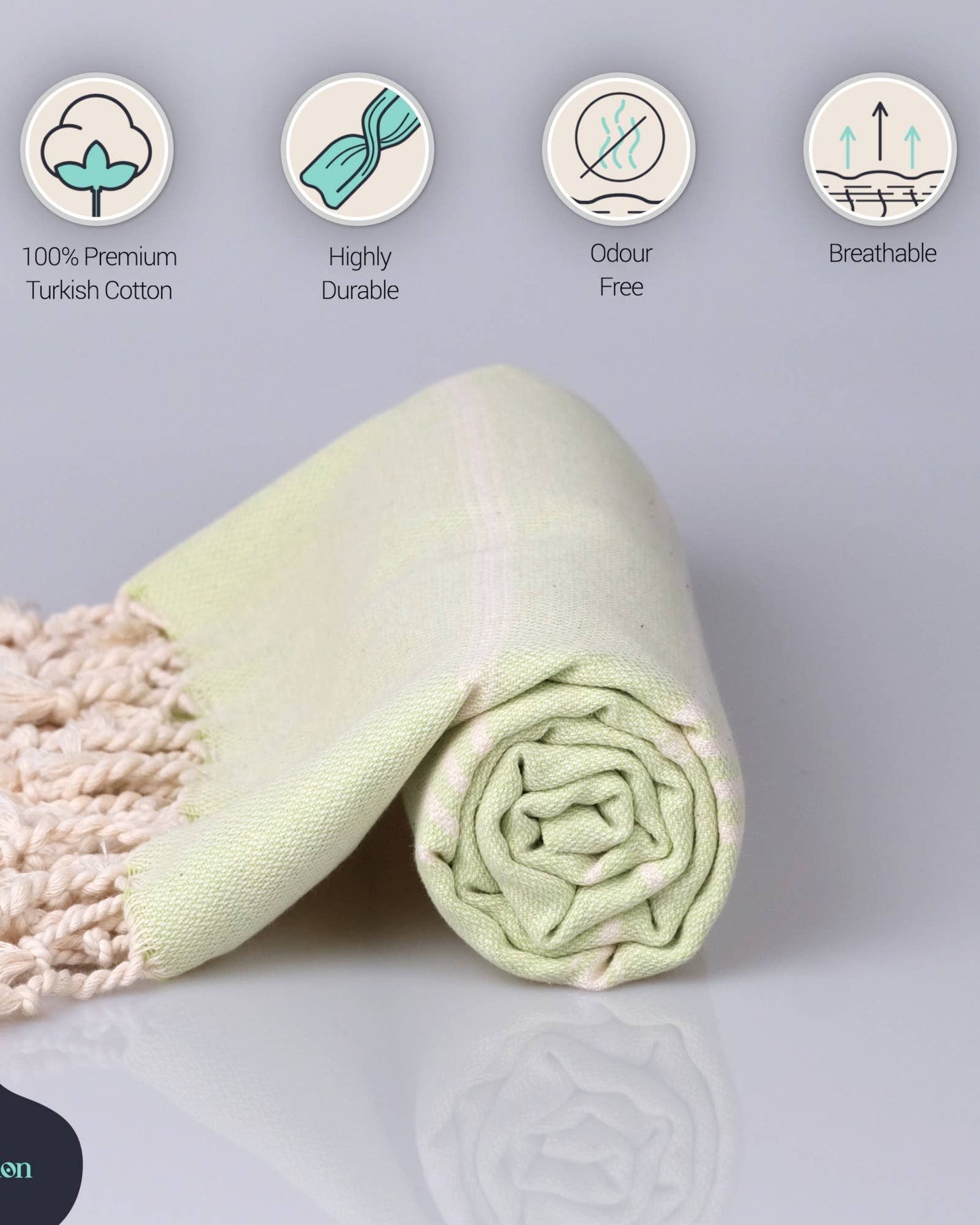 Rolled-up towel with attributes on a light gray background
