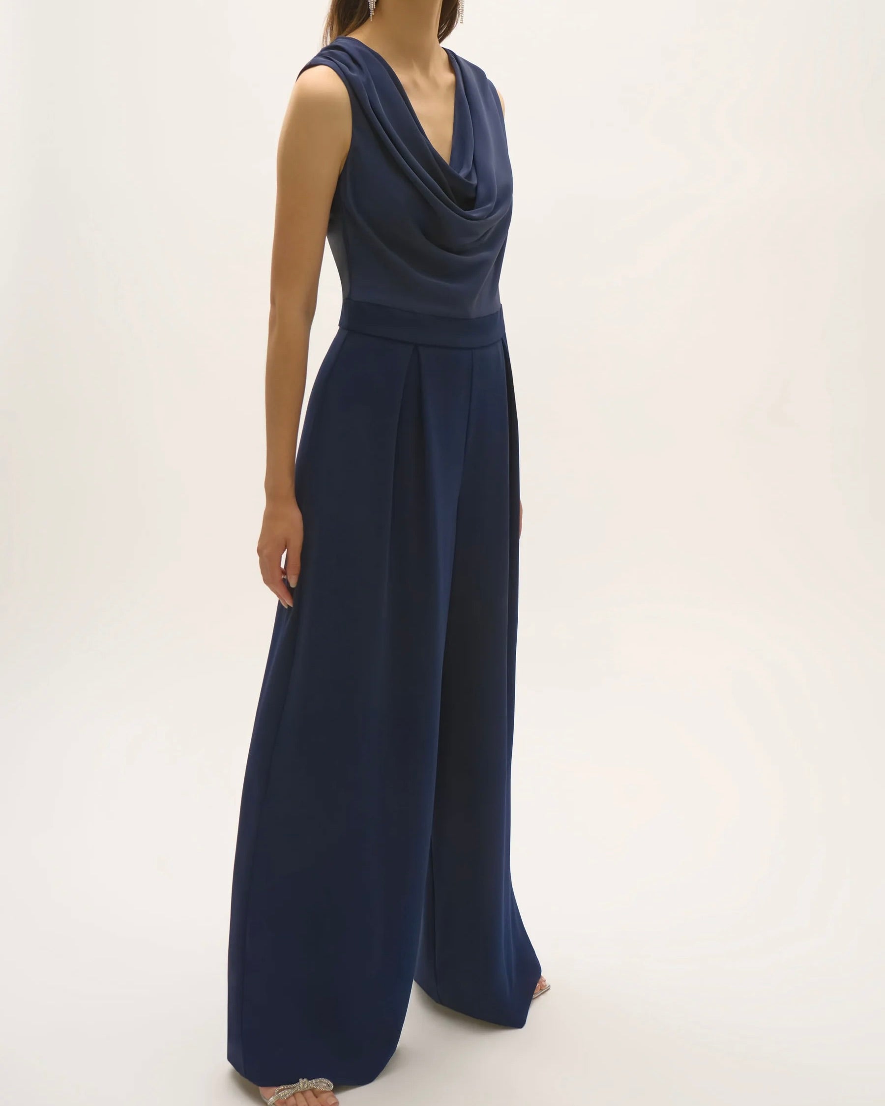 joseph ribkoff satin and crepe wide leg jumpsuit navy blue on model in front of white wall or background