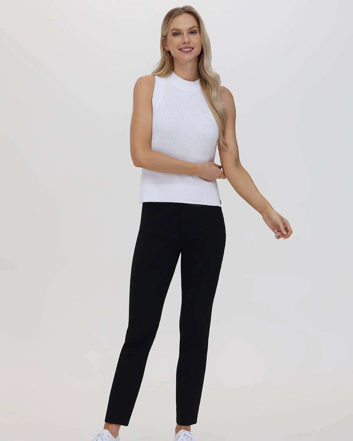 Model wearing 525 Bleach White Demi Tank wearing black jeans on a white background