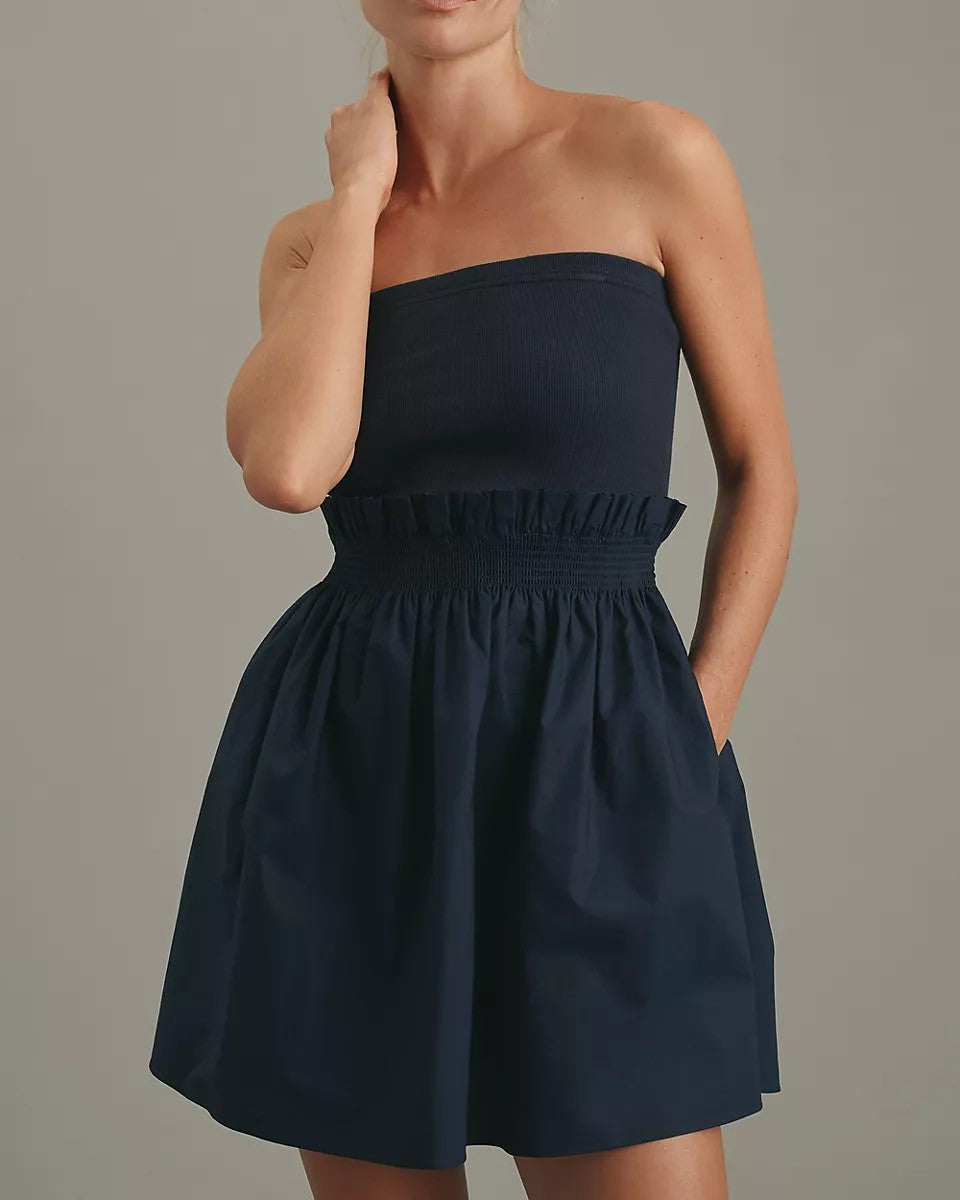 Image of Sundays Adella Dress in Navy on a gray background