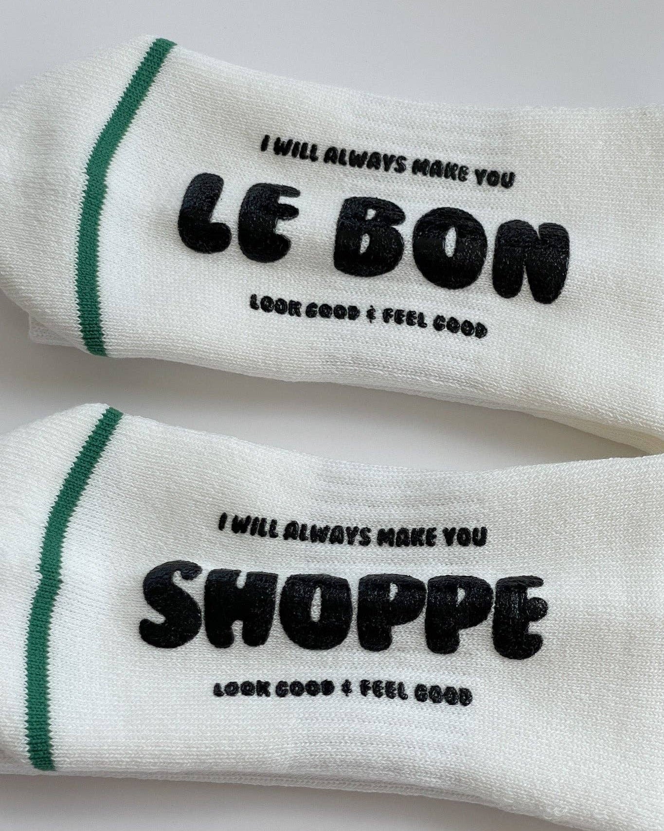 White socks with black text on a white background
