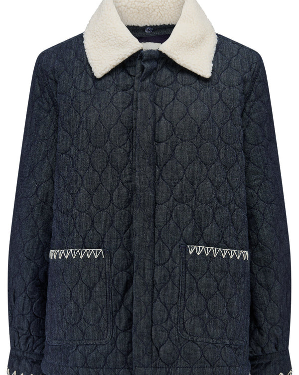 Quilted jacket with a cream collar on a white background