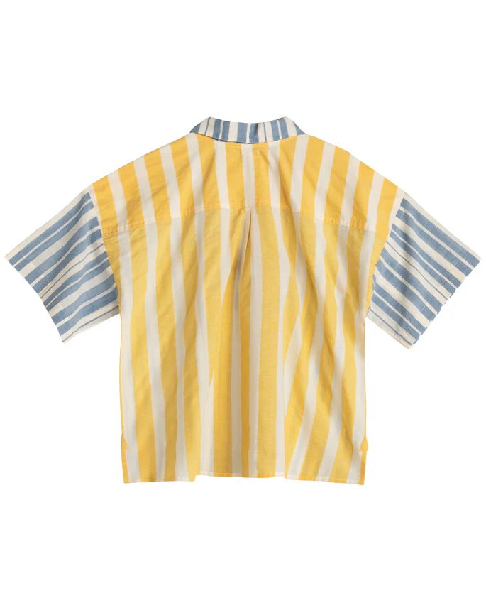 Yellow and blue striped shirt on a white background
