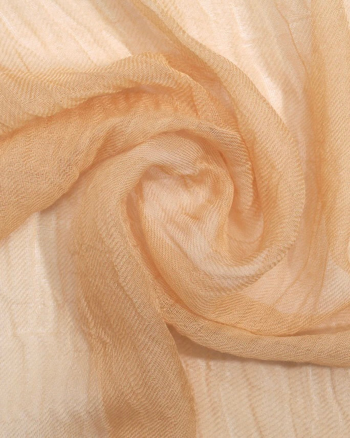 Close-up of beige fabric with a soft texture