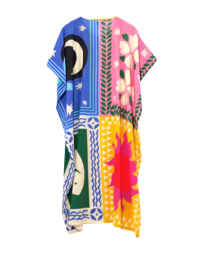 Colorful patterned dress with abstract designs on a white background