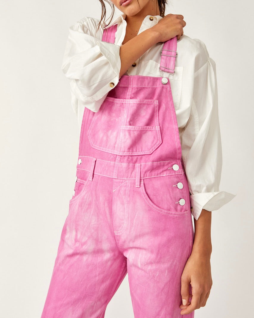 Model Wearing Free People Electric Bouquet Ziggy Denim Overalls wearing a white shirt on a white background